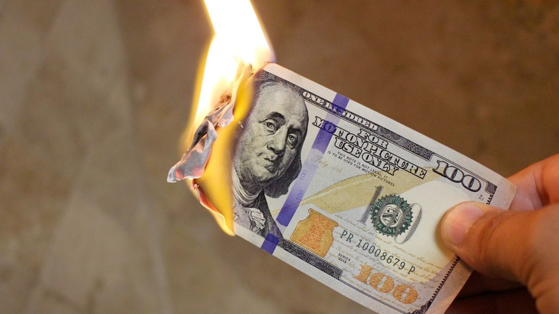 Burning money image
